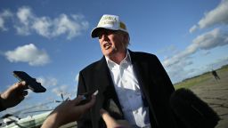 President Donald Trump speaks to reporters before boarding Air Force One.