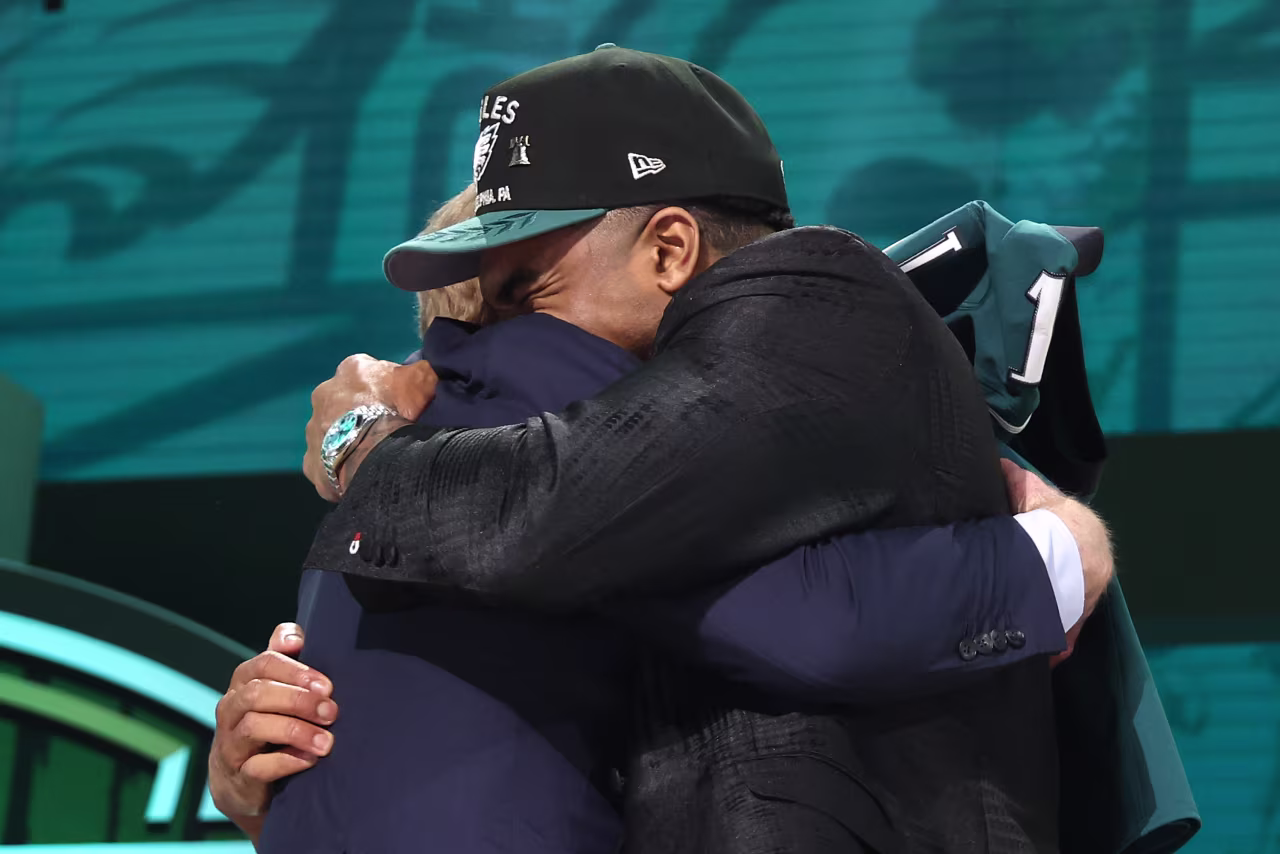 Alabama linebacker Jihaad Campbell hugs Commissioner Roger Goodell after being selected by the Eagles.