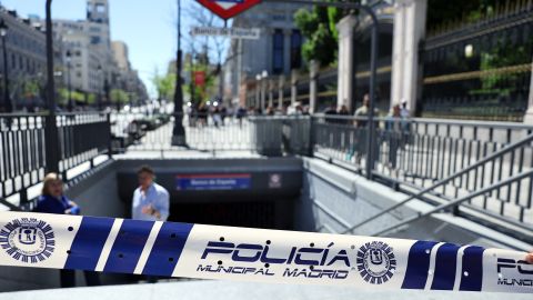A Madrid city police ribbon blocks the access to a metro station in downtown Madrid as subway and trains are totally out of service due to a massive power outage in Spain, on April 28, 2025. Power went out across all of Spain and Portugal today, cutting cellphone and internet networks, halting trains and trapping people in elevators, officials said. The operator, Red Electrica, said it would likely take six to 10 hours to restore power in the country and urged people not to speculate as to the cause of the outage. (Photo by Thomas COEX / AFP) (Photo by THOMAS COEX/AFP via Getty Images)          
