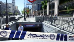 A Madrid city police ribbon blocks the access to a metro station in downtown Madrid as subway and trains are totally out of service due to a massive power outage in Spain, on April 28, 2025. Power went out across all of Spain and Portugal today, cutting cellphone and internet networks, halting trains and trapping people in elevators, officials said. The operator, Red Electrica, said it would likely take six to 10 hours to restore power in the country and urged people not to speculate as to the cause of the outage. (Photo by Thomas COEX / AFP) (Photo by THOMAS COEX/AFP via Getty Images)          