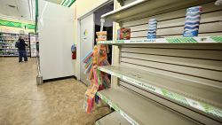 Empty shelves are seen as a man shops for items at a Dollar Tree store on April 28, 2025 in Alhambra, California. Global stocks were steady on April 28 as investors welcomed the absence of further trade war escalation over the weekend and as countries seek to temper US President Donald Trump's tariffs. (Photo by Frederic J. BROWN / AFP) (Photo by FREDERIC J. BROWN/AFP via Getty Images)          