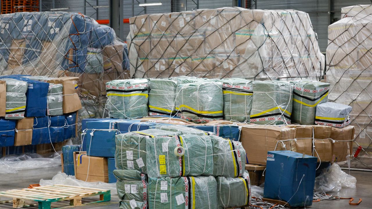 Air freight parcels are seen upon their arrival at a warehouse in Roissy-Charles de Gaulle airport, outside Paris, on April 29, 2025.  is proposing to levy a "handling fee" on every small parcel entering Europe, from 2026, to finance controls that will have to be stepped up to deal with the increase of low-value parcels from China,  of the government said on April 29, 2025 from Roissy-Charles-de-Gaulle airport. (Photo by GEOFFROY VAN DER HASSELT / AFP) (Photo by GEOFFROY VAN DER HASSELT/AFP via Getty Images)          
