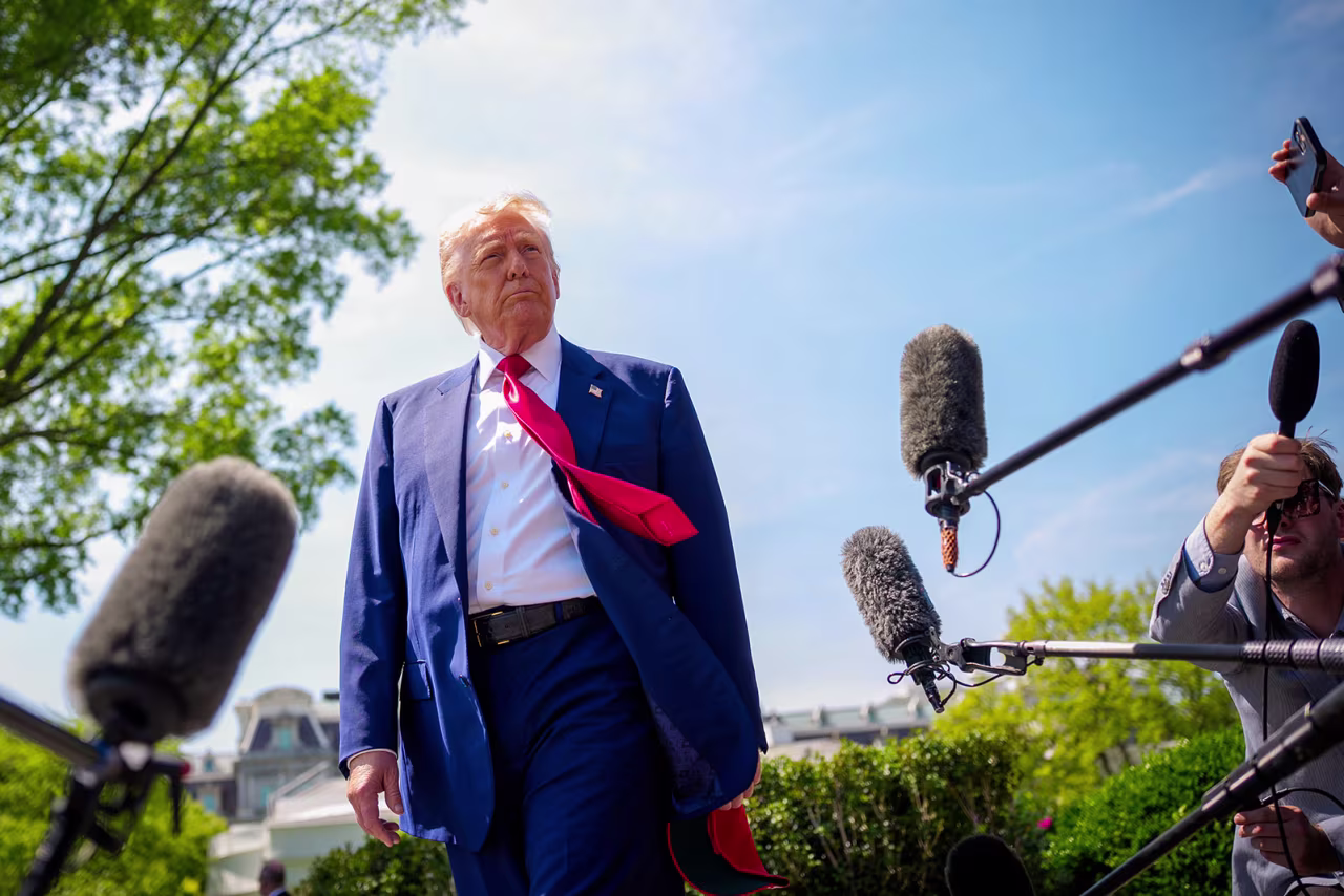 President Donald Trump takes a question from a reporter before boarding Marine One on the South Lawn of the White House on April 29 in Washington, DC.