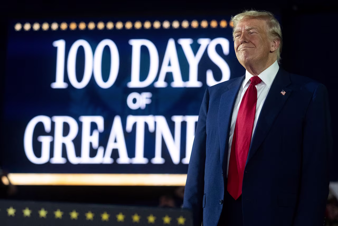 President Donald Trump delivers a speech marking his 100th day in office at Macomb County Community College Sports Expo Center in Warren, Michigan, on Tuesday.