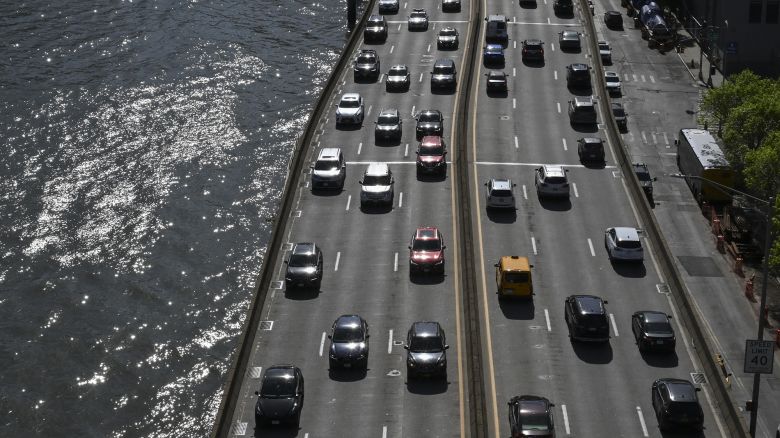Cars drive on the FDR drive on April 30, 2025 in New York City.