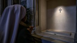 A nun prays in front of the tomb of Pope Francis on the first day of its opening to the public in Santa Maria Maggiore Basilica, on April 27, 2025 in Rome, Italy. Funeral rites for the late Pope Francis are held for nine days after his burial as he is mourned and celebrated by the faithful. During this time, the Vatican prepares for the process to elect a new Pope, known as the Conclave, which must begin within 15 to 20 days of the Pope's death.