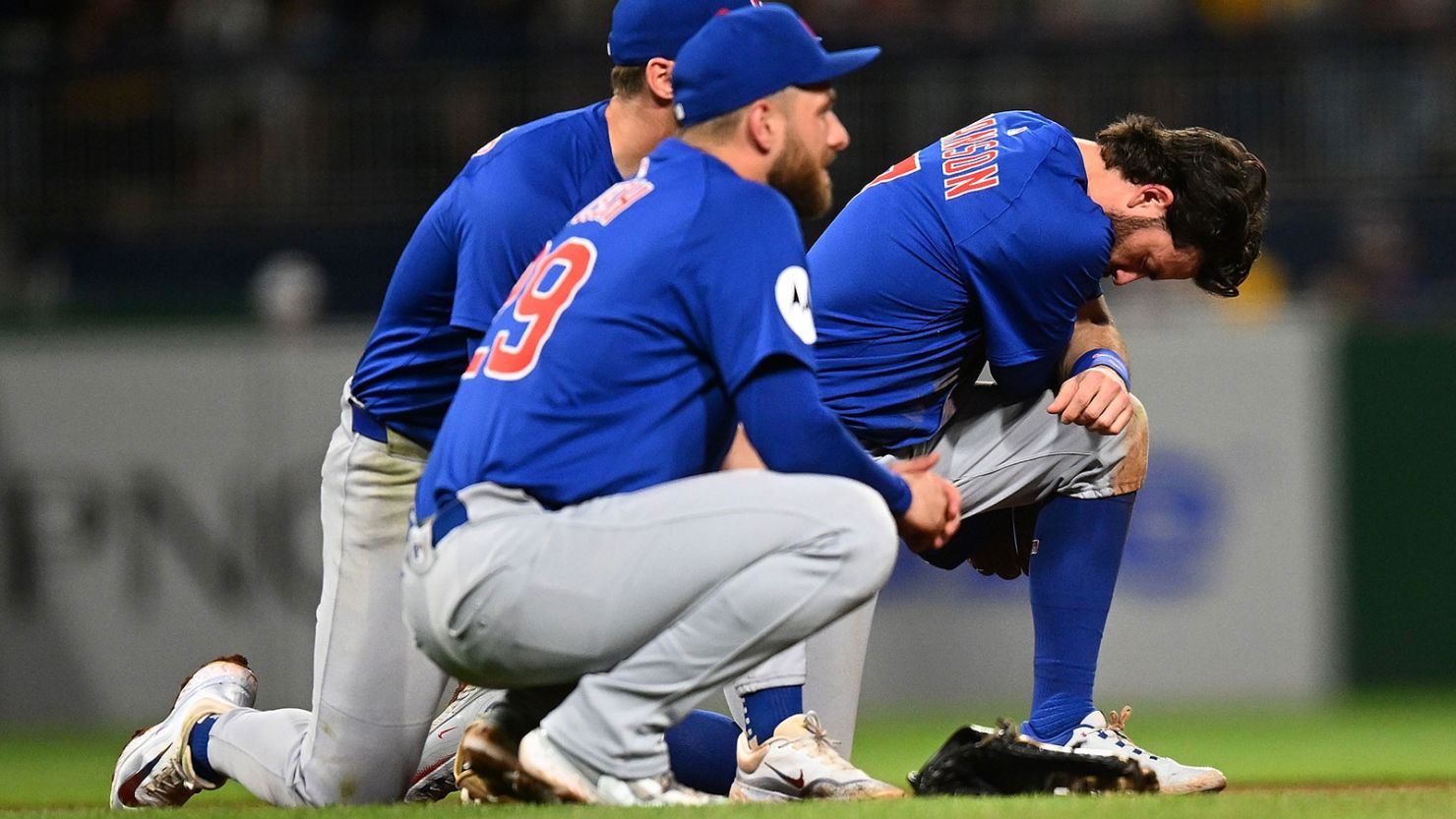 Dansby Swanson and Michael Busch of the Chicago Cubs look on after a fan fell from the stands during the seventh inning against the Pittsburgh Pirates at PNC Park.