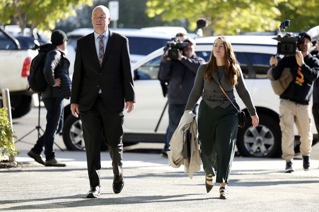 Simon Patterson (L) arrives at Latrobe Valley Magistrates' Court where his estranged wife Erin Patterson is on trial for allegedly murdering his parents, aunt and uncle.