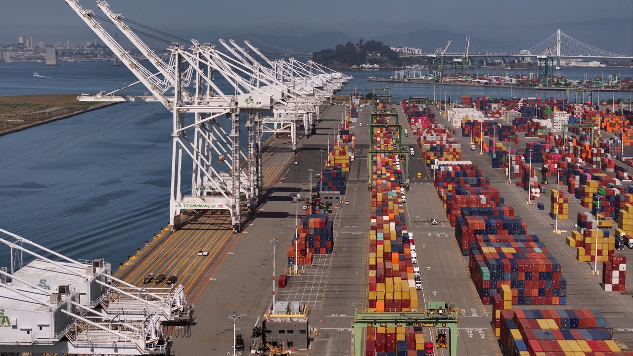 In an aerial view, shipping cranes sit idle at the Port of Oakland on April 28 in Oakland, California.