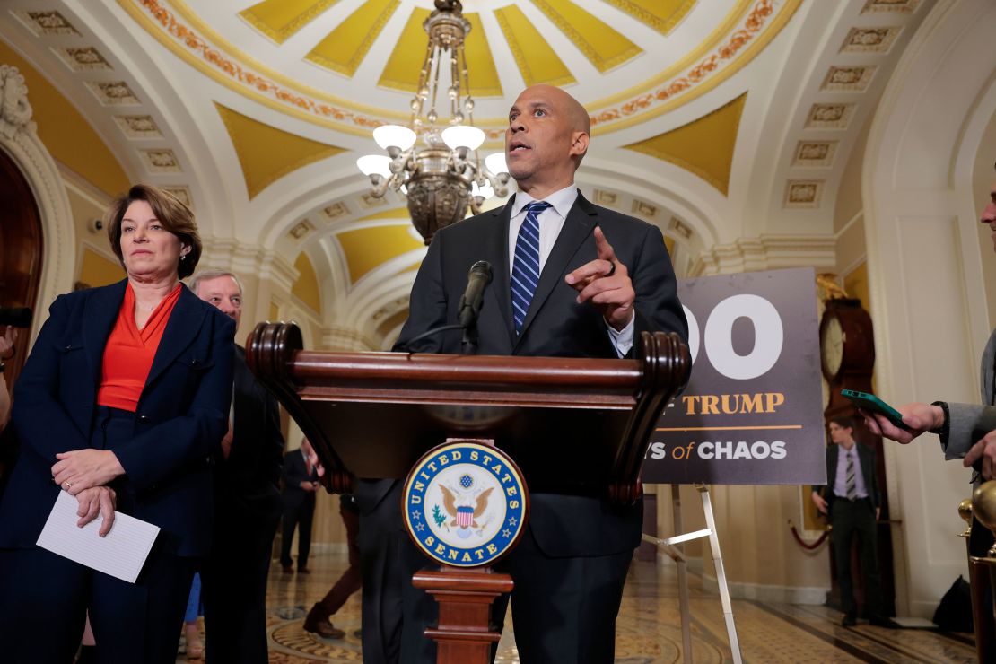 WASHINGTON, DC - APRIL 29: U.S. Sen. Cory Booker (D-NJ) speaks to reporters alongside U.S. Sen. Amy Klobuchar (D-MN) (L) and U.S. Sen. Richard Durbin (D-IL) (C) following the weekly Senate Democrat policy luncheon at the U.S. Capitol on April 29, 2025 in Washington, DC. During the news conference Senate Democrats spoke of U.S. President Donald Trump's first 100 days back in office. (Photo by Anna Moneymaker/Getty Images)