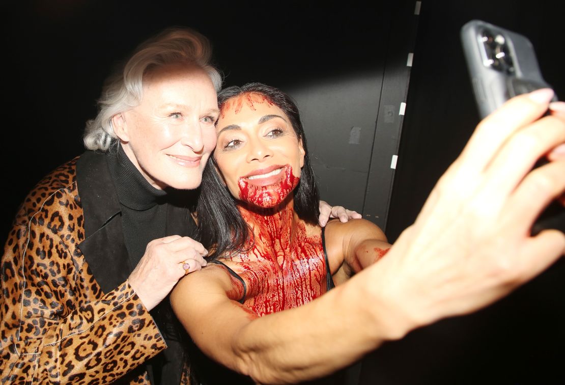 Glenn Close and Nicole Scherzinger, who is wearing stage makeup, pose for a selfie backstage at the hit musical 
