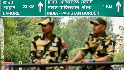 Indian Border Security Force (BSF) personnel stand guard near the India-Pakistan Wagah border post, about 35kms from Amritsar on May 4, 2025. Nuclear-armed rivals India and Pakistan have exchanged gunfire for ten consecutive nights across their heavily militarised de facto border in the contested Kashmir region since an April 22 attack on civilians that New Delhi blames on Pakistan, claims Islamabad denies. (Photo by Narinder NANU / AFP) (Photo by NARINDER NANU/AFP via Getty Images)