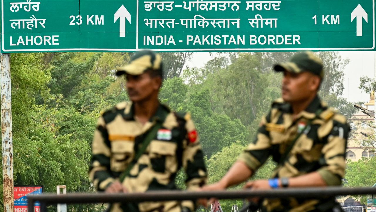 Indian Border Security Force (BSF) personnel stand guard near the India-Pakistan Wagah border post, about 35kms from Amritsar on May 4, 2025. Nuclear-armed rivals India and Pakistan have exchanged gunfire for ten consecutive nights across their heavily militarised de facto border in the contested Kashmir region since an April 22 attack on civilians that New Delhi blames on Pakistan, claims Islamabad denies. (Photo by Narinder NANU / AFP) (Photo by NARINDER NANU/AFP via Getty Images)          