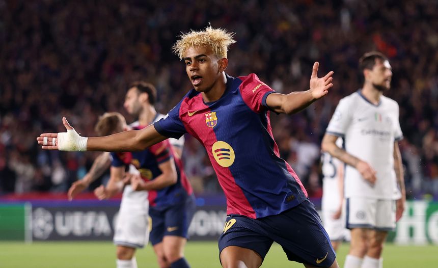 Barcelona's Lamine Yamal celebrates scoring against Inter Milan in the UEFA Champions League.