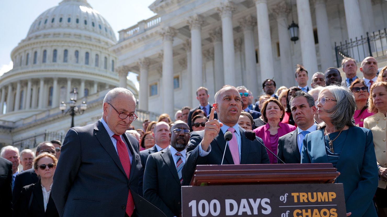 House Minority Leader Hakeem Jeffries (D-NY) (C) joins Senate Minority Leader Charles Schumer (D-NY) and dozens of fellow Democratic lawmakers to mark the first 100 days of President Donald Trump's second term in the White House on the East Steps of the US Capitol on April 30, 2025 in Washington, DC.