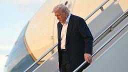US President Donald Trump disembarks from Air Force One upon arrival at Joint Base Andrews in Maryland, May 4, 2025, as he returns to the White House after spending the weekend in Florida.