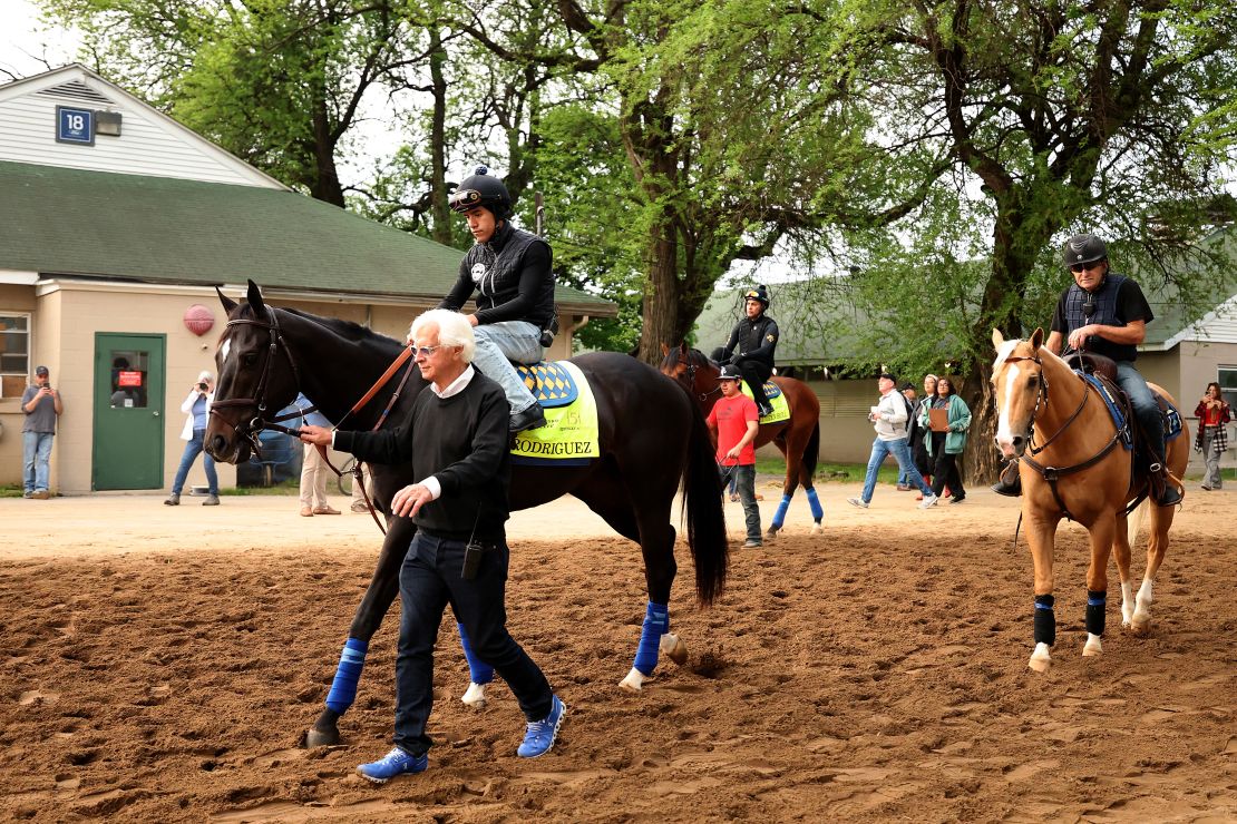 Bob Baffert walks with Rodriguez on Thursday prior to the running of the 151st Kentucky Derby at Churchill Downs.