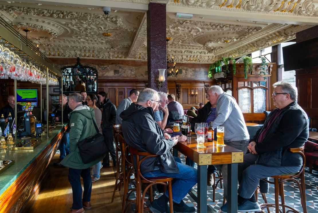 Few pubs have table service. Most drinks are served to customers over the bar.