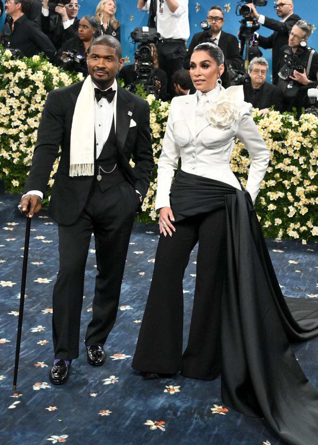 Usher y Jennifer Goicoechea.