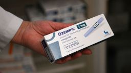 A pharmacy owner shows an Ozempic antidiabetic medicine at a pharmacy in Pristina on March 27, 2025. The antidiabetic medicine of Ozempic is surging in Kosovo as a quick-fix weight loss solution, driving up demand and sending prices soaring, despite warnings about possible side effects of the Diabetes drug. (Photo by Armend NIMANI / AFP) (Photo by ARMEND NIMANI/AFP via Getty Images)          