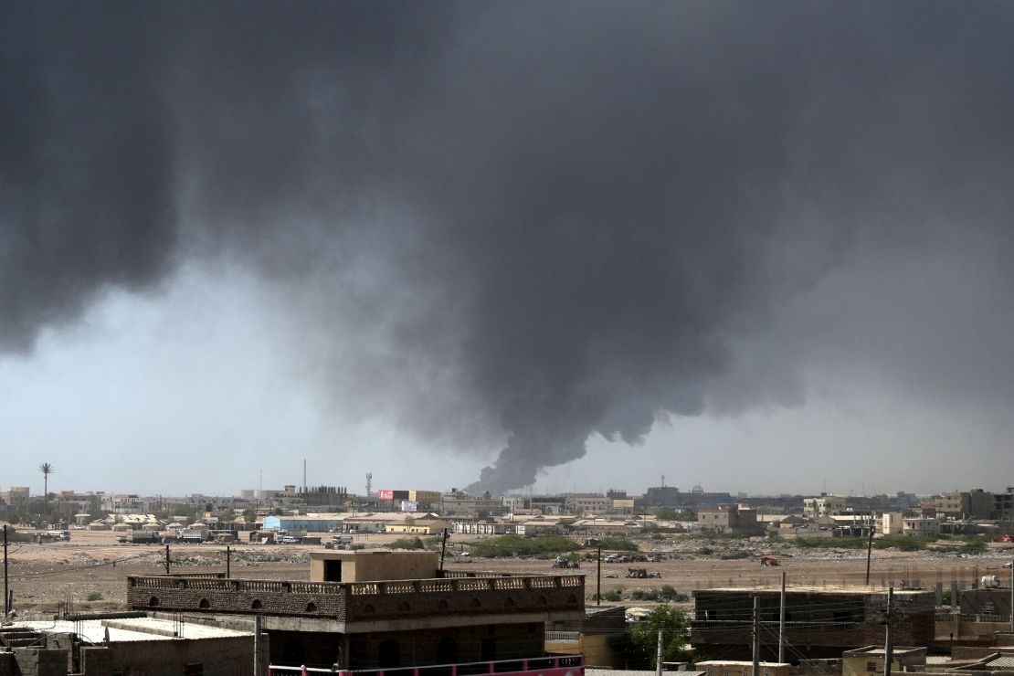 Smoke billows after a drone strike on Port Sudan on Tuesday.