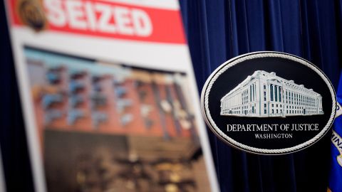 WASHINGTON, DC - MAY 6: A poster depicting an image of firearms seized is displayed before U.S. Attorney General Pam Bondi arrives for a news conference at the Department of Justice on May 6, 2025 in Washington, DC. The Justice Department along with the Drug Enforcement Administration (DEA) and the U.S. Attorney's Office for the District of New Mexico are set to announce that they have completed an operation targeting a large drug trafficking organization that has been dealing fentanyl and other illicit narcotics. (Photo by Andrew Harnik/Getty Images)