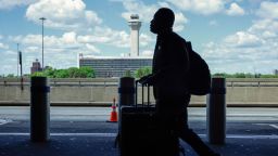 The FAA Air Traffic Control tower is seen at Newark Liberty International Airport in Newark, New Jersey on May 7, 2025. Regulators have been slowing arrivals and departures at one of the United States' busiest airports following a 90-second traffic control system outage last week that has industry experts sounding alarm bells. (Photo by kena betancur / AFP) (Photo by KENA BETANCUR/AFP via Getty Images)          