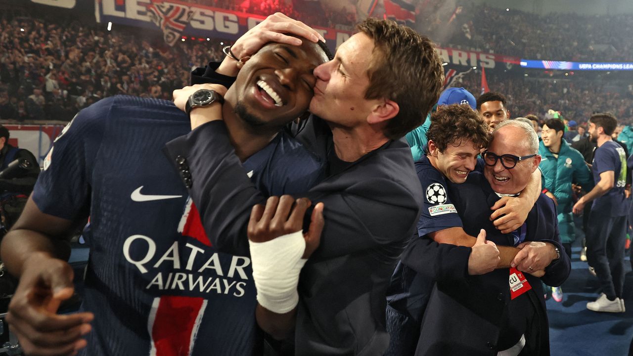 TOPSHOT - PSG's players celebrate their victory at the end of the UEFA Champions League semi-final second leg football match between Paris Saint-Germain (PSG) and Arsenal at the Parc des Princes stadium in Paris, on May 7, 2025. (Photo by FRANCK FIFE / AFP) (Photo by FRANCK FIFE/AFP via Getty Images)          