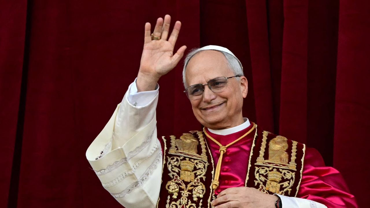 Newly elected Pope Leo XIV, Robert Prevost addresses the crowd from the main central loggia balcony of the St Peter's Basilica for the first time, after the cardinals ended the conclave, in The Vatican, on May 8, 2025. Robert Francis Prevost was on Thursday elected the first pope from the United States, the Vatican announced. A moderate who was close to Pope Francis and spent years as a missionary in Peru, he becomes the Catholic Church's 267th pontiff, taking the papal name Leo XIV. (Photo by Tiziana FABI / AFP) (Photo by TIZIANA FABI/AFP via Getty Images)          