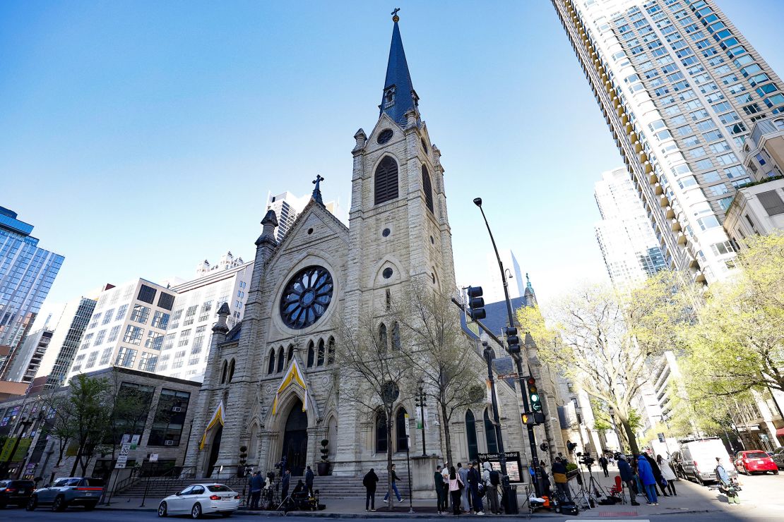 News outlets work outside the Holy Name Cathedral after Cardinal Robert Prevost, who was born in Chicago, had been named as first American leader of the Catholic Church in Chicago, Illinois, on May 8, 2025. (Photo by KAMIL KRZACZYNSKI / AFP) (Photo by KAMIL KRZACZYNSKI/AFP via Getty Images)