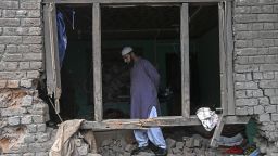 TOPSHOT - A local resident inspects his house that was damaged by Pakistani artillery shelling in Uri, about 100kms from Srinagar, on May 9, 2025. India said on May 9 it had repulsed a wave of Pakistani drone and artillery attacks overnight, and Islamabad insisted it had not struck targets across the border, as the latest conflict between the nuclear-armed neighbours showed no signs of relenting. (Photo by Tauseef MUSTAFA / AFP) (Photo by TAUSEEF MUSTAFA/AFP via Getty Images)          