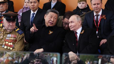 In this pool photograph distributed by the Russian state agency Sputnik, Russia's President Vladimir Putin and Chinese President Xi Jinping attend the Victory Day military parade at Red Square in central Moscow on May 9, 2025. Russia celebrates the 80th anniversary of the Soviet Union's victory over Nazi Germany in World War Two (WWII). (Photo by Vyacheslav PROKOFYEV / POOL / AFP) (Photo by VYACHESLAV PROKOFYEV/POOL/AFP via Getty Images)          