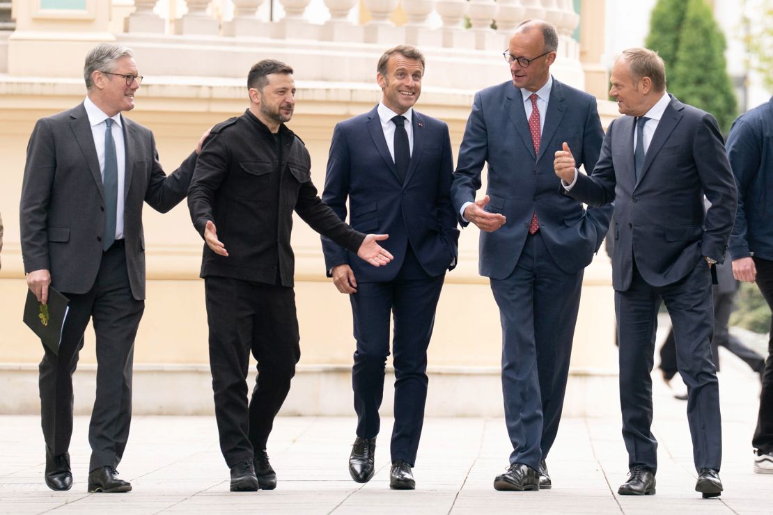 Left to right: UK Prime Minister Keir Starmer, Ukrainian President Volodymyr Zelensky, Macron, Merz and Poland's Prime Minister Donald Tusk walk at the Presidential Palace in Kyiv, Ukraine, on May 10, 2025.