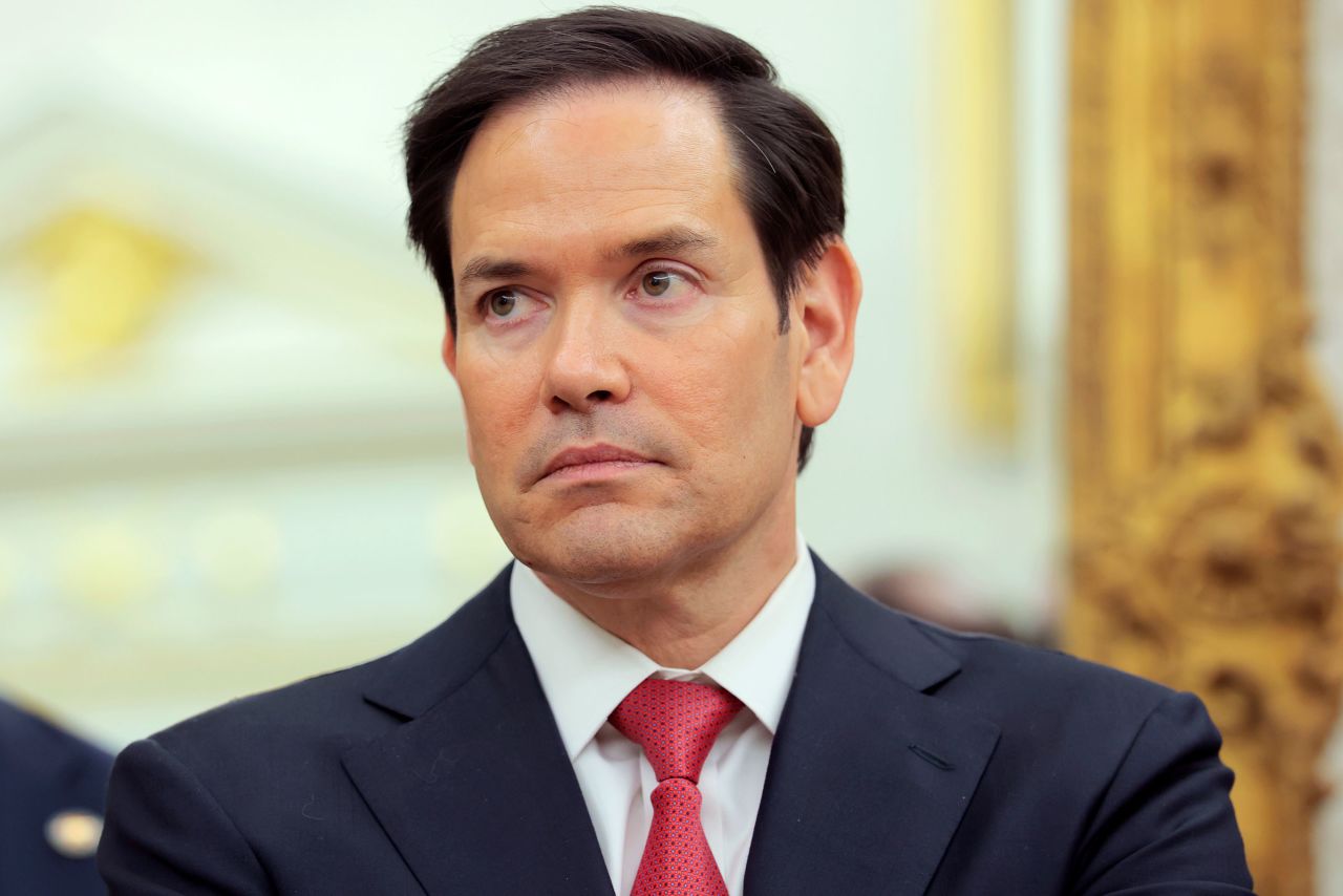 U.S. Secretary of State Marco Rubio listens as U.S. President Donald Trump speaks in the Oval Office at the White House on May 6.