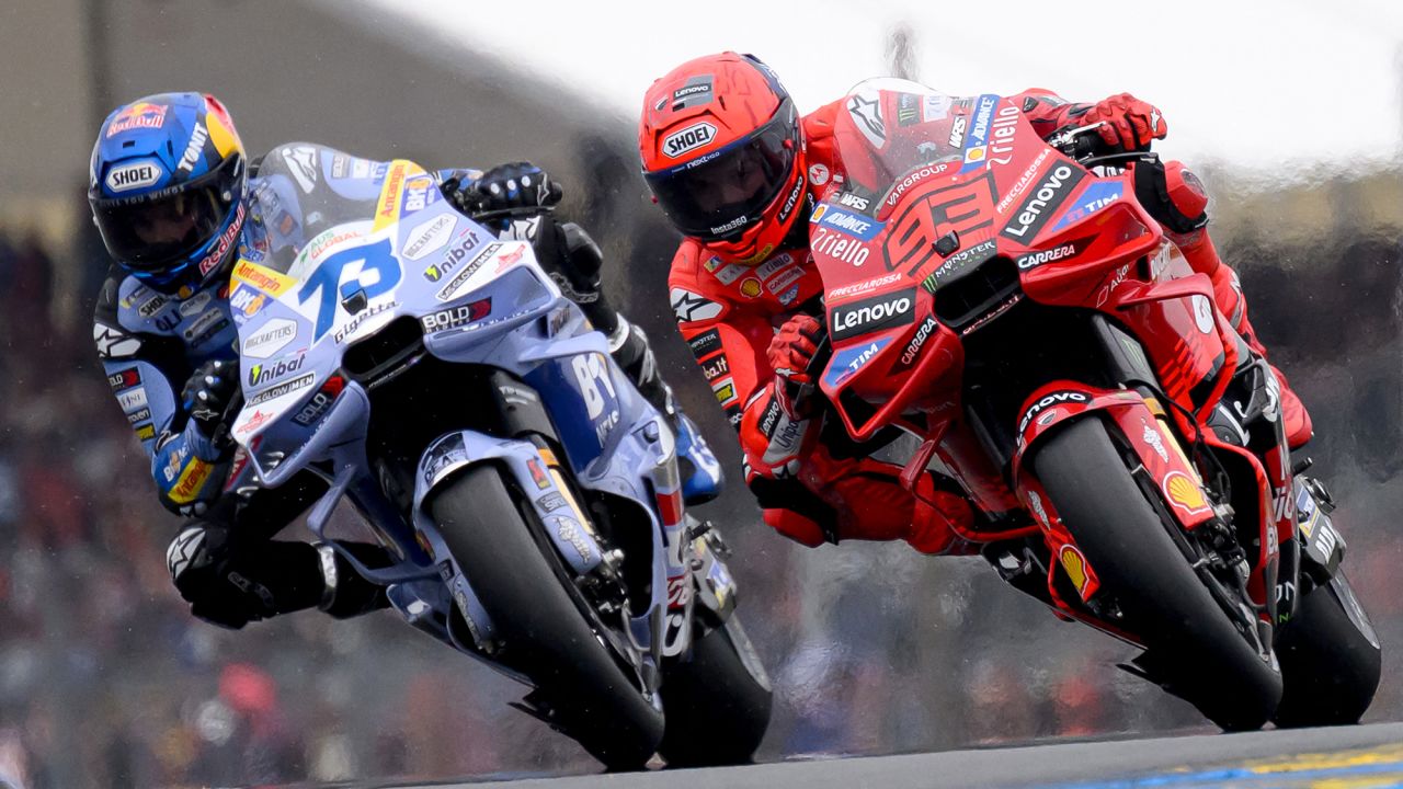 Ducati Lenovo Team's Spanish MotoGP rider Marc Marquez (R) rides ahead of his brother BK8 Gresini Racing MotoGP team's Spanish MotoGP rider Alex Marquez during the France Moto GP race at the Le Mans Circuit on May 11, 2025.  (Photo by Loic VENANCE / AFP) (Photo by LOIC VENANCE/AFP via Getty Images)          