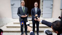 US Treasury Secretary Scott Bessent (L) and US Trade Representative Jamieson Greer speak to the media in Geneva.