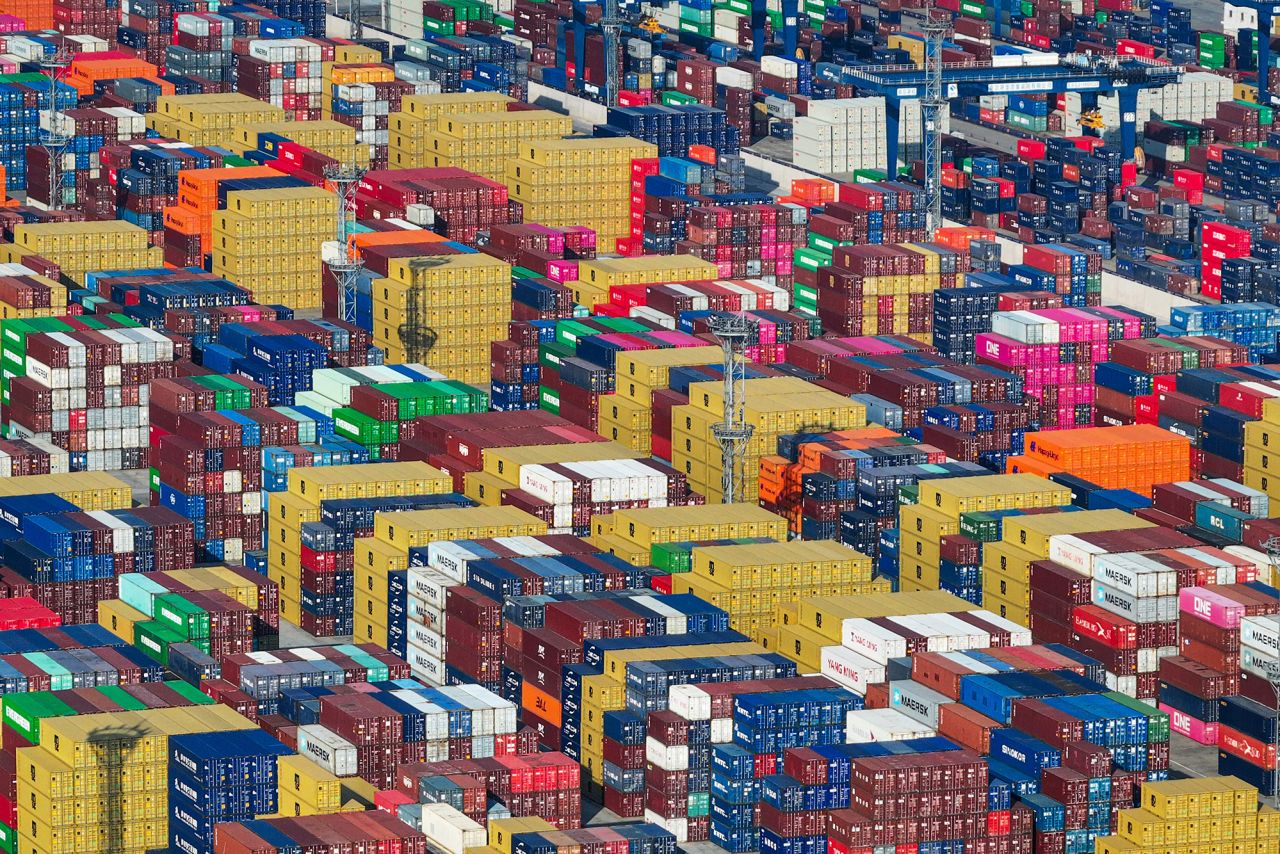 Containers are stacked at a port in Nanjing, in eastern China's Jiangsu province on Monday.