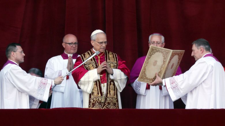 VATICAN CITY, VATICAN - MAY 8: The newly elected Pontiff, Pope Leo XIV is seen for the first time from the Vatican balcony on May 8, 2025 in Vatican City, Vatican. White smoke was seen over the Vatican early this evening as the Conclave of Cardinals took just two days to elect Cardinal Robert Francis Prevost, who will be known as Pope Leo (Leone) XIV, as the 267th Supreme Pontiff after the death of Pope Francis on Easter Monday. (Photo by Dan Kitwood/Getty Images)