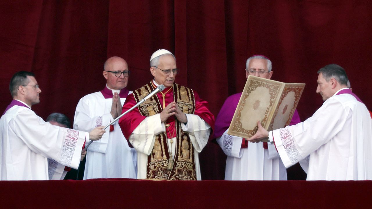 VATICAN CITY, VATICAN - MAY 8: The newly elected Pontiff, Pope Leo XIV is seen for the first time from the Vatican balcony on May 8, 2025 in Vatican City, Vatican. White smoke was seen over the Vatican early this evening as the Conclave of Cardinals took just two days to elect Cardinal Robert Francis Prevost, who will be known as Pope Leo (Leone) XIV, as the 267th Supreme Pontiff after the death of Pope Francis on Easter Monday. (Photo by Dan Kitwood/Getty Images)