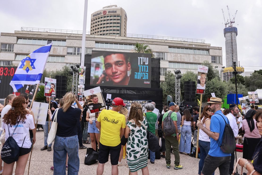 People hold portraits of hostages held by Palestinian militants in Gaza since October 2023, during a rally in anticipation of the release of Israeli-US soldier Edan Alexander at Hostages Square Tel Aviv on Monday.