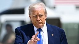 US President Donald Trump gestures as he walks to board Air Force One at t Base Andrews in Maryland on May 12, 2025. President Trump is travelling to the Middle East, where Saudi Arabia will be the first stop on a four-day trip. (Photo by Brendan SMIALOWSKI / AFP) (Photo by BRENDAN SMIALOWSKI/AFP via Getty Images)          