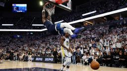 MINNEAPOLIS, MINNESOTA - MAY 08: Julius Randle #30 of the Minnesota Timberwolves dunks the ball as Jimmy Butler III #10 of the Golden State Warriors looks on in the fourth quarter of Game Two of the Western Conference Second Round NBA Playoffs at Target Center on May 08, 2025 in Minneapolis, Minnesota. The Timberwolves defeated the Warriors 117-93 to tie the series 1-1. NOTE TO USER: User expressly acknowledges and agrees that, by downloading and or using this photograph, User is consenting to the terms and conditions of the Getty Images License Agreement. (Photo by David Berding/Getty Images)