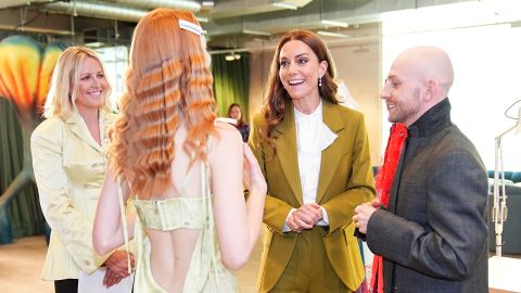 LONDON, ENGLAND - MAY 13:  Catherine, Princess of Wales tours design spaces with designer Patrick McDowell (right) and British Fashion Council CEO Laura Weir, during a visit to present the Queen Elizabeth II Award for British Design, at the British Fashion Council at 180 Studios on May 13, 2025 in London, England. (Photo by Aaron Chown - WPA Pool/Getty Images)