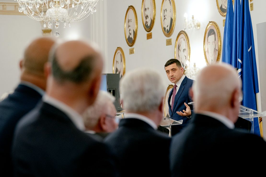 Presidential candidate George Simion takes part in a talk organised by the Romanian Chamber of Commerce on May 13, 2025 in Bucharest, Romania.