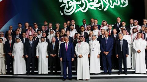 US President Donald Trump (centre left) and Saudi Crown Prince Mohammed bin Salman (centre right) pose for a photo with business leaders at the King Abdul Aziz International Conference Center while attending a Saudi-US business investment forum on May 13, 2025, in Riyadh, Saudi Arabia.