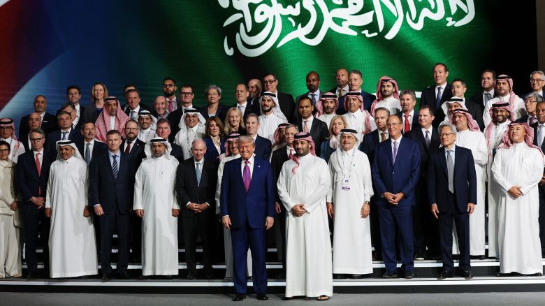 US President Donald Trump (centre left) and Saudi Crown Prince Mohammed bin Salman (centre right) pose for a photo with business leaders at the King Abdul Aziz International Conference Center while attending a Saudi-US business investment forum on May 13, 2025, in Riyadh, Saudi Arabia.