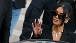 TOPSHOT - US celebrity Kim Kardashian leaves the courthouse after testifying before the Assize Court for the trial over the 2016 robbery that saw her relieved of millions of dollars' worth of jewellery at gunpoint in Paris, on May 13, 2025. The trial of this sensational nine million euro jewellery robbery opened in Paris on April 28, 2025. (Photo by Alain JOCARD / AFP) (Photo by ALAIN JOCARD/AFP via Getty Images)          