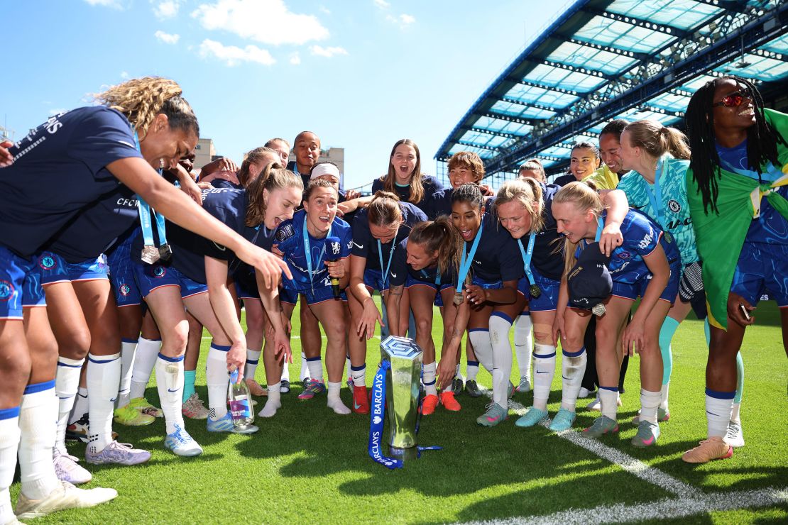 Chelsea players celebrate winning the WSL trophy this season.