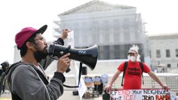 Demonstrators protest for immigrant rights outside the Supreme Court in Washington, DC, on May 15.