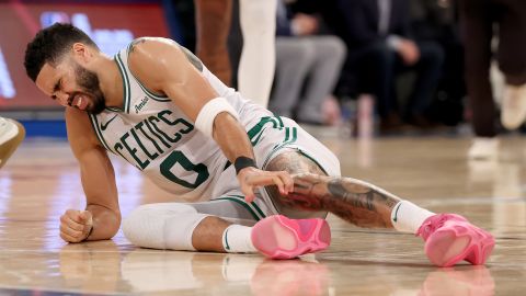 NEW YORK, NEW YORK - MAY 12:  Jayson Tatum #0 of the Boston Celtics lays on the ground after being injured against the New York Knicks during the fourth quarter in Game Four of the Eastern Conference Second Round NBA Playoffs at Madison Square Garden on May 12, 2025 in New York City. NOTE TO USER: User expressly acknowledges and agrees that, by downloading and or using this photograph, User is consenting to the terms and conditions of the Getty Images License Agreement. (Photo by Elsa/Getty Images). (Photo by Elsa/Getty Images)